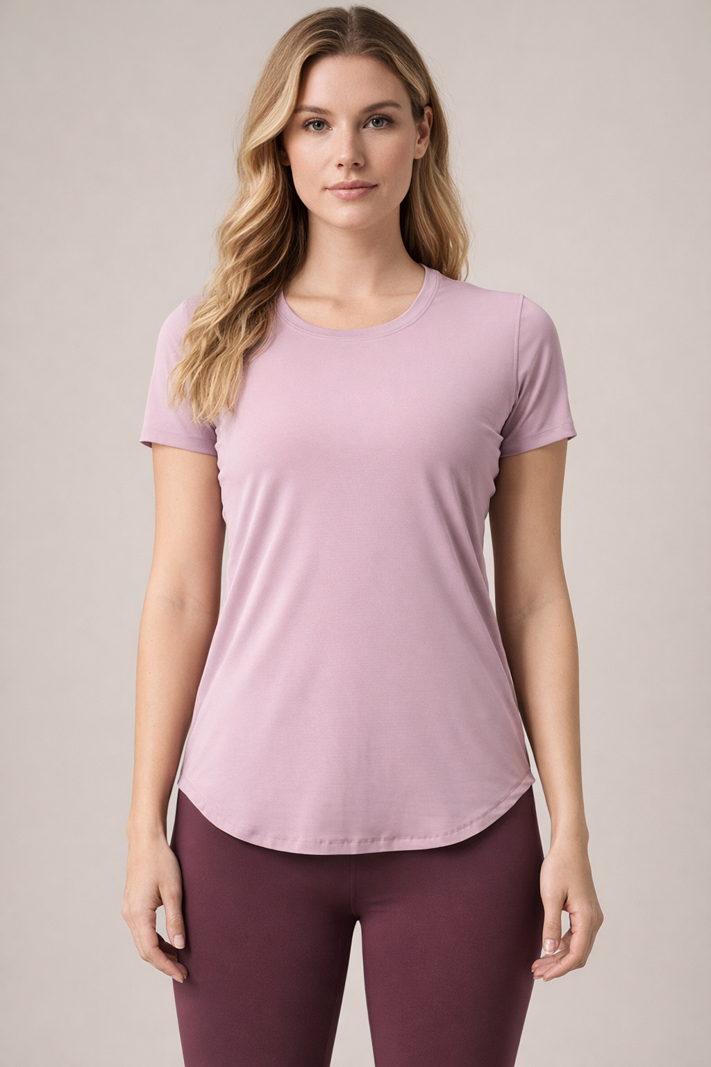 Woman wearing Blush Mauve BareEase Performance Tee